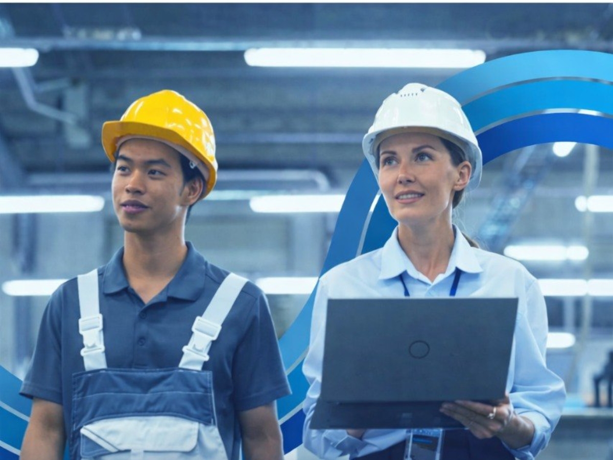 Engineers walking through a production plant